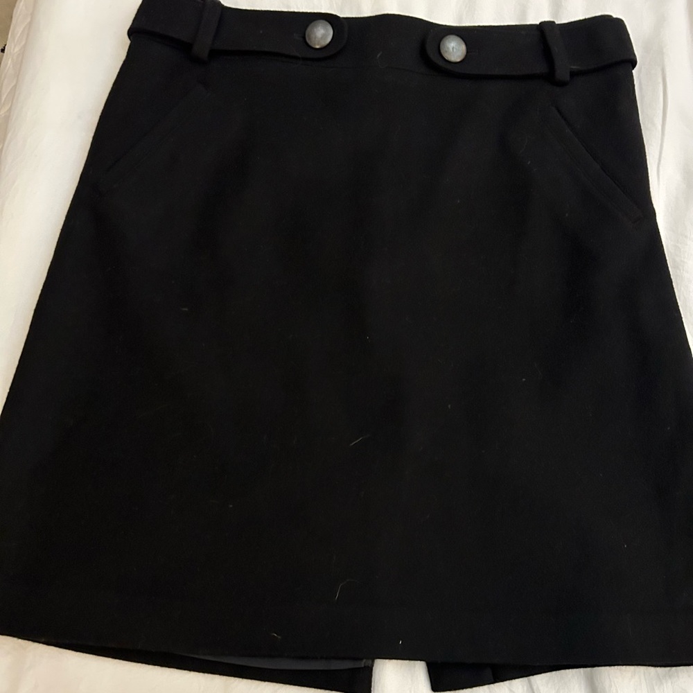 Club Monaco Skirt Black size 6. Faux Front Belt, Nickel tone buttons.Backzip